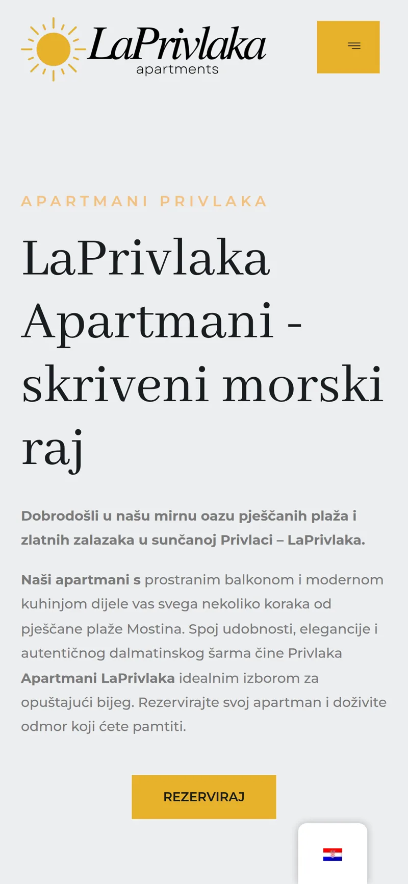 Izrada web stranice LaPrivlaka: mobilni prikaz naslovnice s logotipom sunca, naslovom i žutim gumbom Rezerviraj